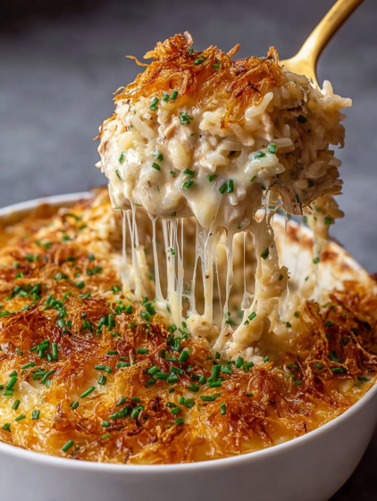 A close up of a French Onion Chicken Rice Bake.