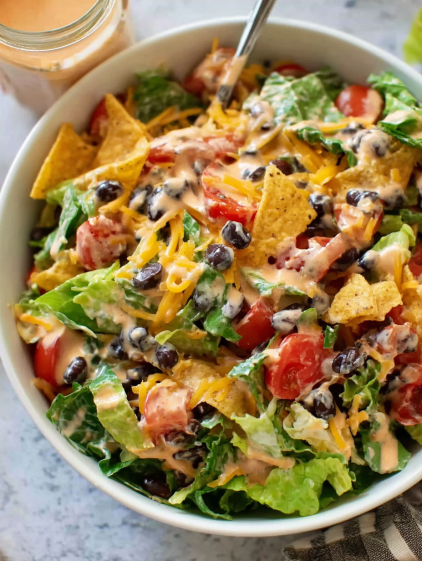 A bowl of Frito Taco Salad.