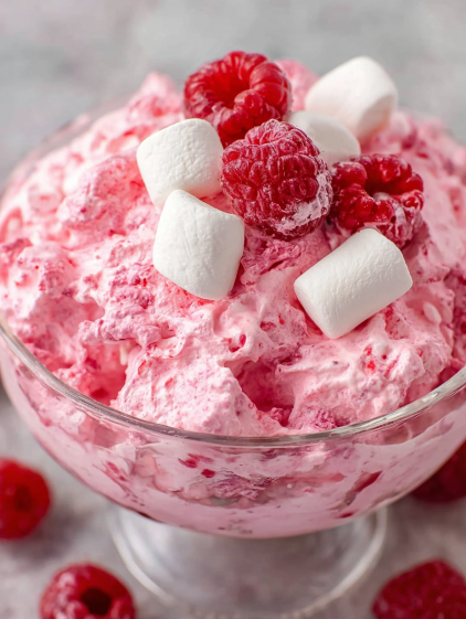 A bowl of pink raspberry fluff.
