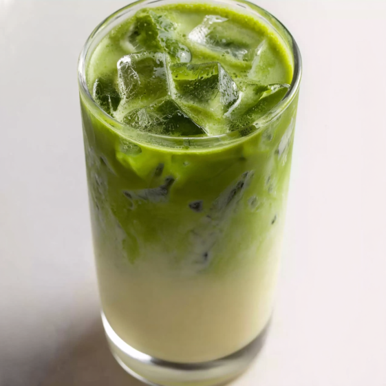 A glass of iced matcha latte.