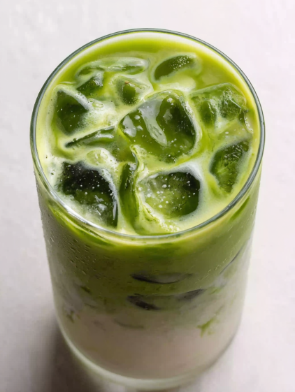 A glass of iced matcha latte.