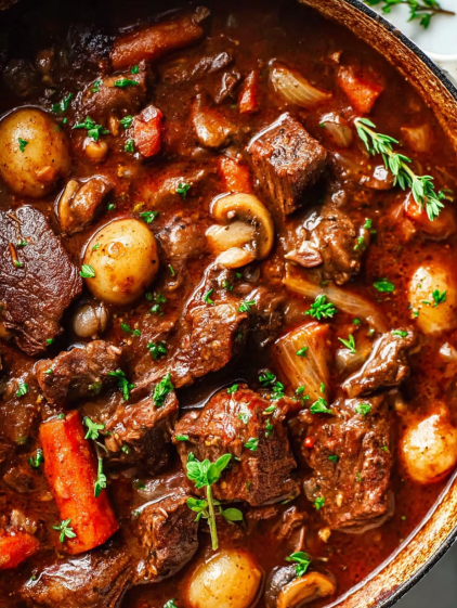 A close up of a beef bourguignon dish.