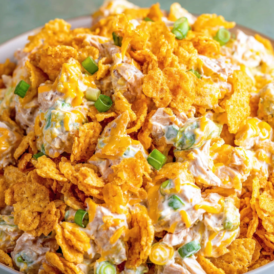 A bowl of Frito Corn Salad.