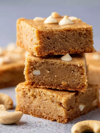 A stack of white chocolate blondies.
