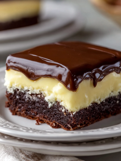 A slice of chocolate cake on a plate.