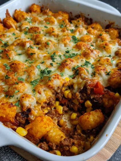 A white plate with a casserole dish on it.