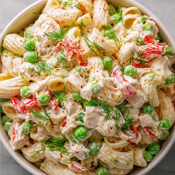 A bowl of crab pasta salad.