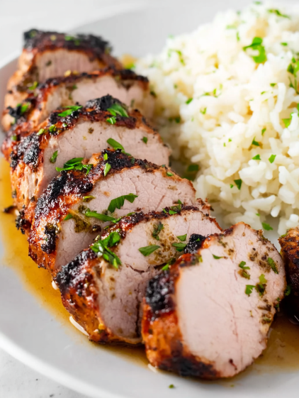 A piece of pork tenderloin cooked in an air fryer.