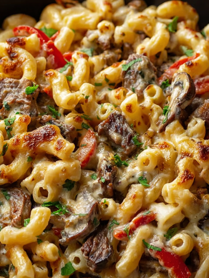 A close up of a Philly Cheesesteak Pasta Bake.