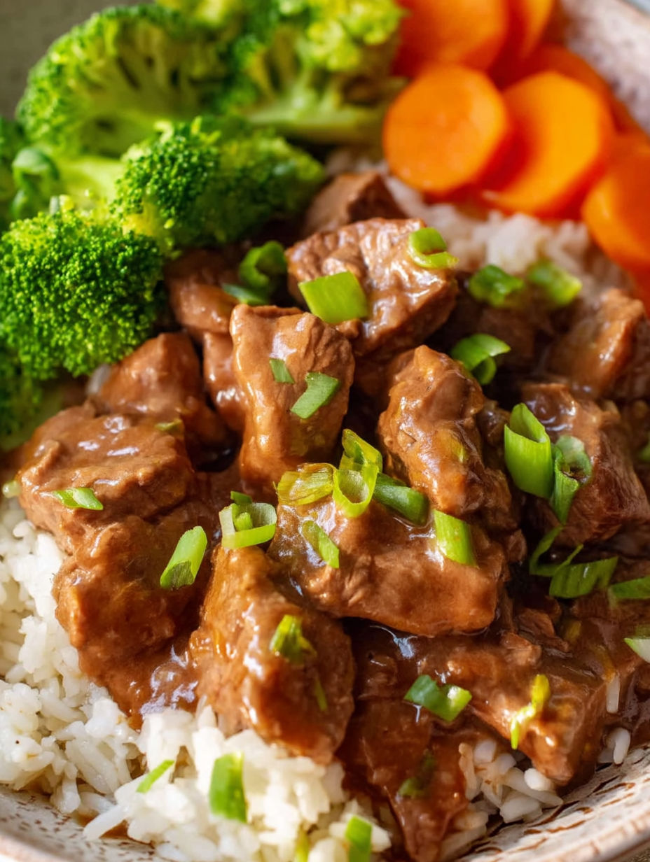 A close up of a delicious beef and broccoli dish.