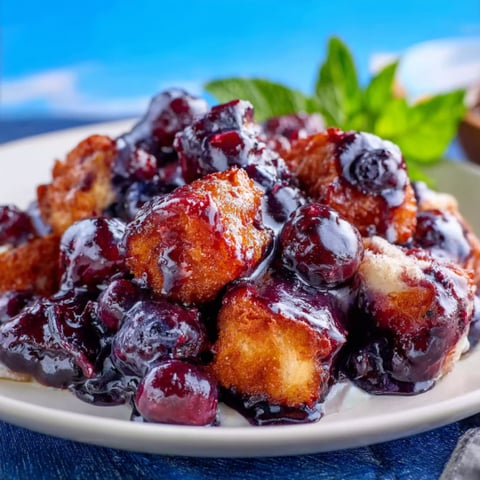 A plate of blueberry bubble up.