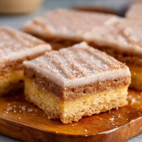 Brown sugar pop tart bars on a wooden tray.