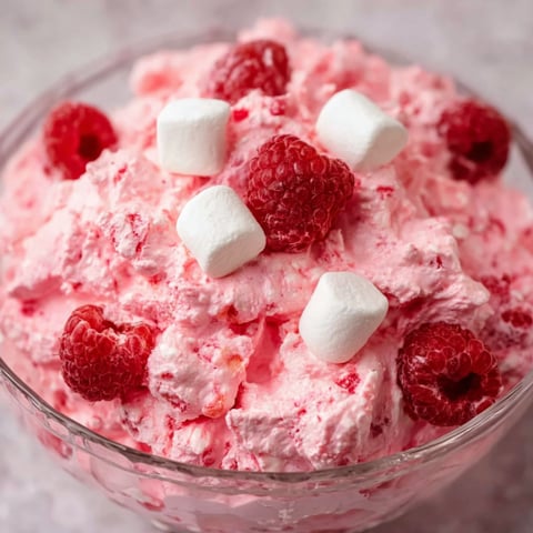 A bowl of pink raspberry fluff.