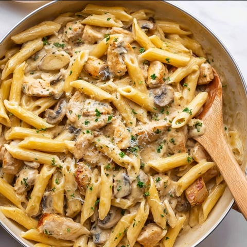 A creamy mushroom chicken pasta dish.