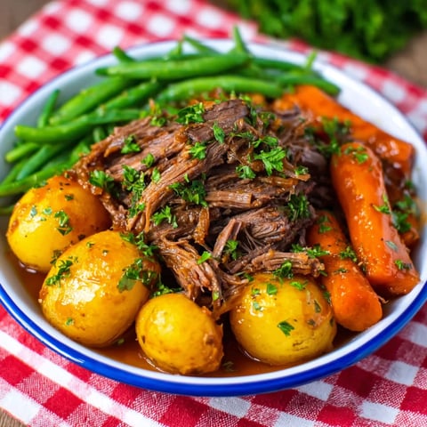 A plate of food with meat and vegetables.