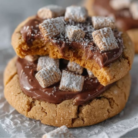 A cookie with chocolate and marshmallows on top.